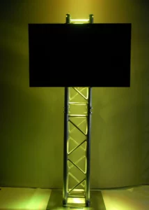 Projector screen with stand mounted on green wall for displaying videos at the party, Canberra DJ hire, 8 til late